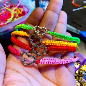 Woven evil eye heart bracelet. Triple heart woven bracelet.